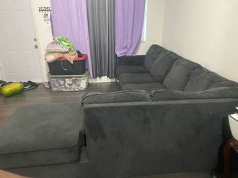 Grey L shaped couch