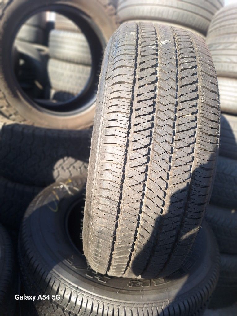 265/65/17/ $300 BRIGESTONE SEMI NEW FOUR TIRES