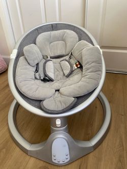 Grey baby swing