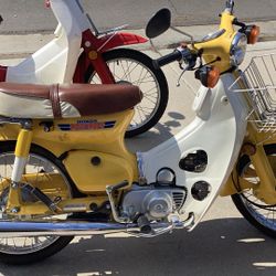 Two Honda bikes