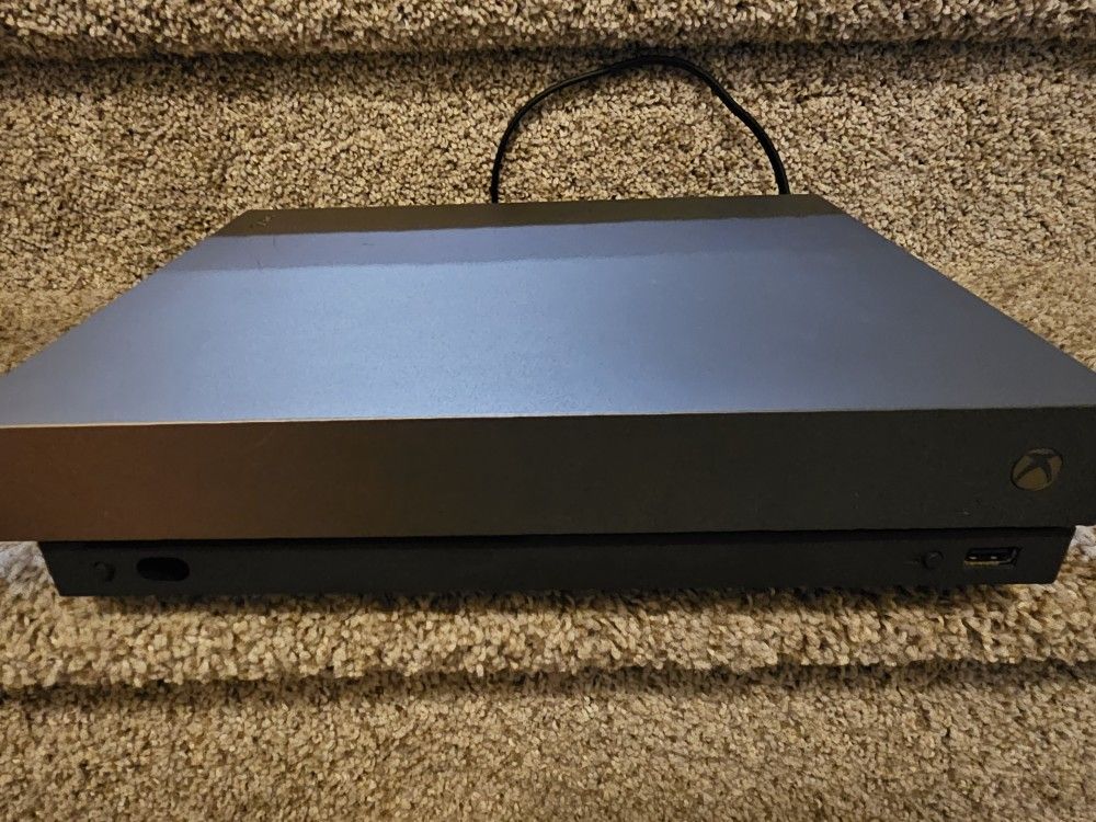 Xbox One X (FOR PARTS/STUCK ON HOME)