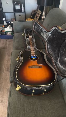 Epiphone inspired by Gibson acoustic guitar