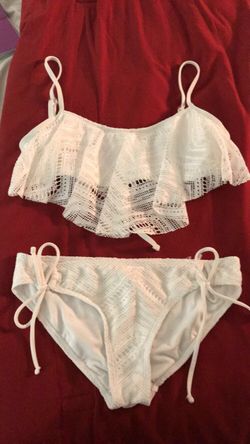 White terno bikini worn just 1 time but still excellent condition top the size is medium and the underwear size is s