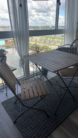 Bistro wood and iron table and chairs