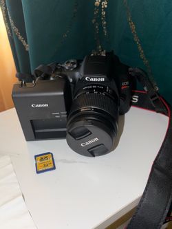 Negotiable  Canon Rebel T7 w/ Lens and battery with other accessories
