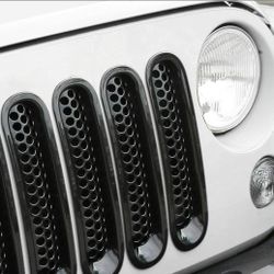New 7-piece front mesh grille inserts designed for the 2007-2015 Jeep Wrangler JK