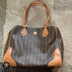 This is a Rioni Signature (Brown) Large Boston Bag made of designer canvas and Italian leather trim