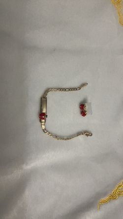 Gold-Tone ID Bracelet with lady bug