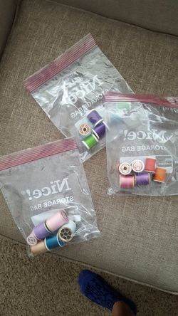Small spools of thread