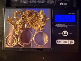 24.66 grams of assorted 14k yellow gold jewelry.