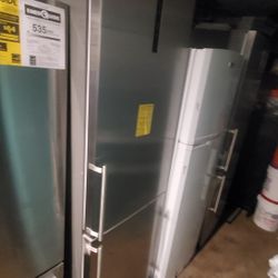 summit 24 inches new open box warranty  72 hight stainless botton freezer