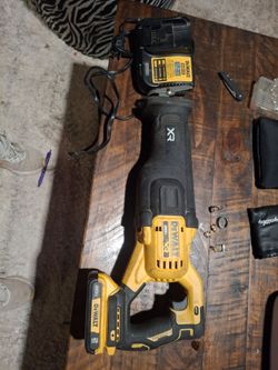 Dewalt reciprocating saw with battery and charger