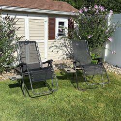 Zero gravity set of two chairs with side tables