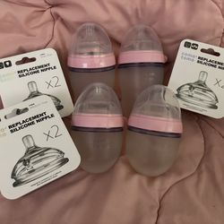 4 Como Tomo Bottles.