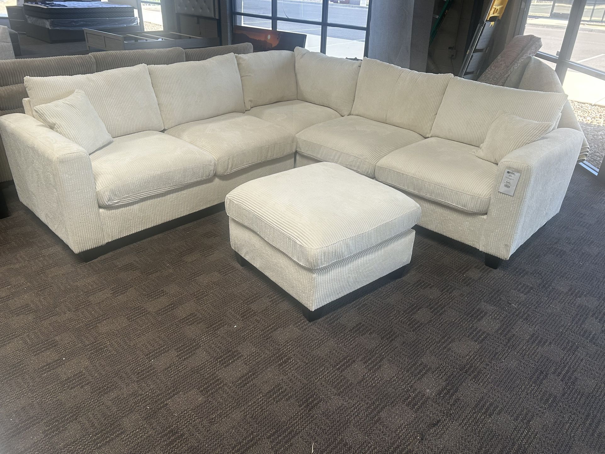 Cream Comfy Sectional And Ottoman