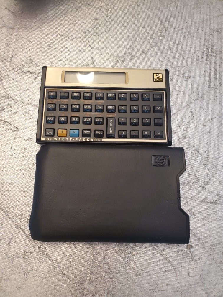 HP 12C Pocket Gold Black Financial Calculator w/ Sleeve - Hewlett-Packard