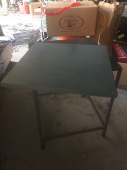 Table with a granite top $10 16 x 16 x 22”