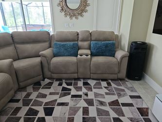 Signature design by Ashley Sofa and they all recline.