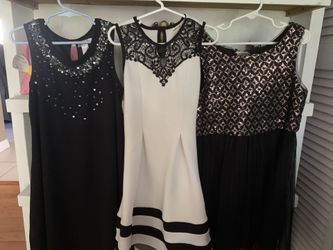 Three dresses and skirt size 8 girls