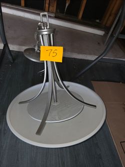 Stylish modern metal chandelier with a sleek design.