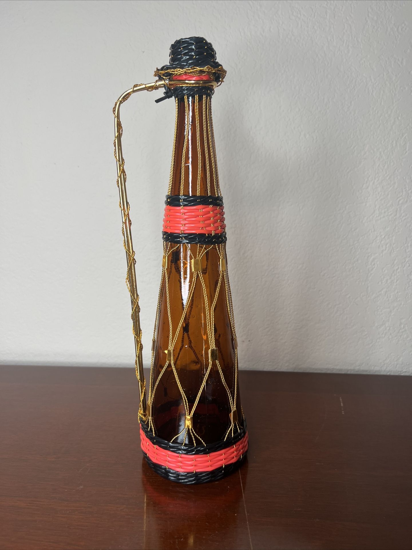 MCM Amber Glass Bottle Decanter Jug Metal Handle Woven Wire Spain Bulliconte