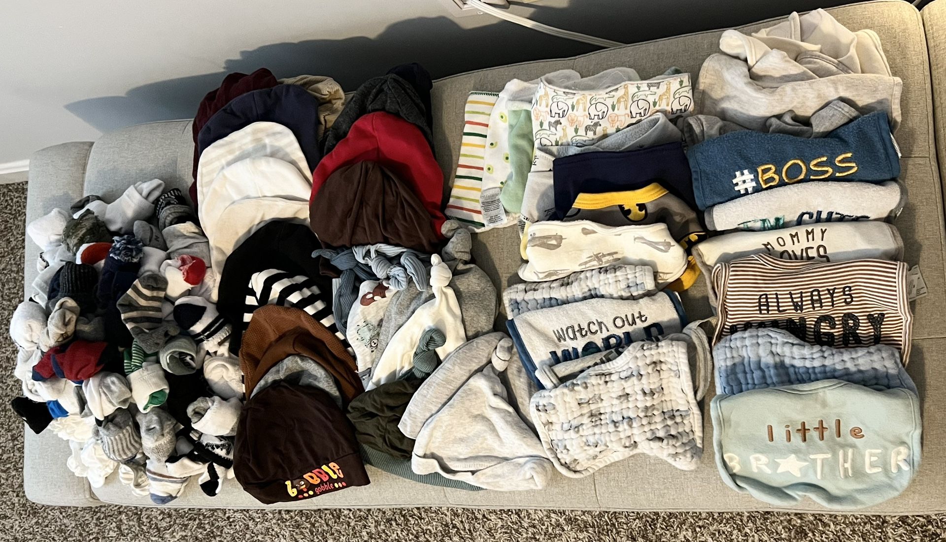 Baby bibs, hats, socks & gloves.