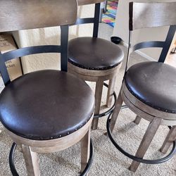 Pinnadel Counter Height Upholstered Swivel Barstool
