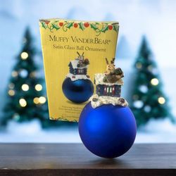 Vintage Muffy Vanderbear "Muffy ReinBear" Blue Satin Glass Ball Ornament by North American Bear Company. Manufactured in 1996. Excellent condition.