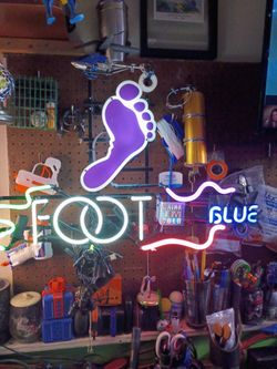 Foot blue glass neon sign