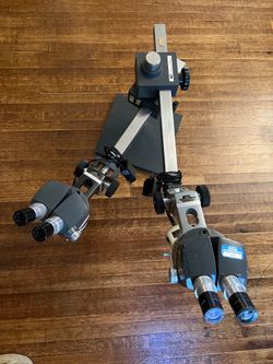 (2) American Optical AO 570 StereoStar Zoom Microscopes on Boom Stand