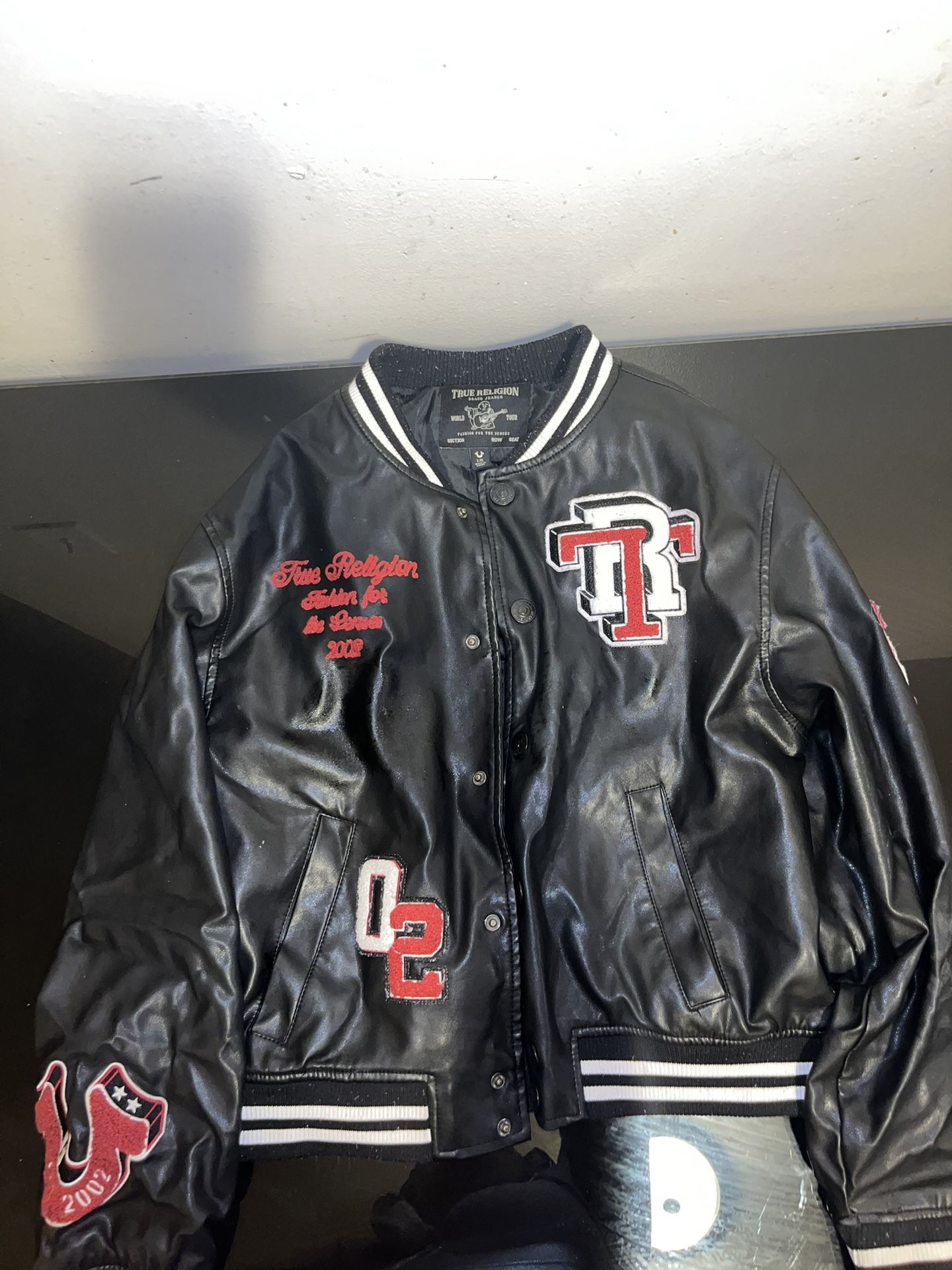 True Religion Black Leather Jacket with Red and White Details