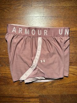 Women's Under Armour pink shorts with spandex in size medium