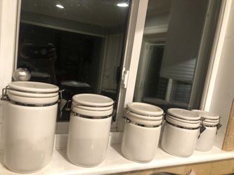 White Ceramic Canisters With Spoons
