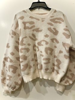 women's cream and beige leopard print crewneck sweater with drop shoulders  