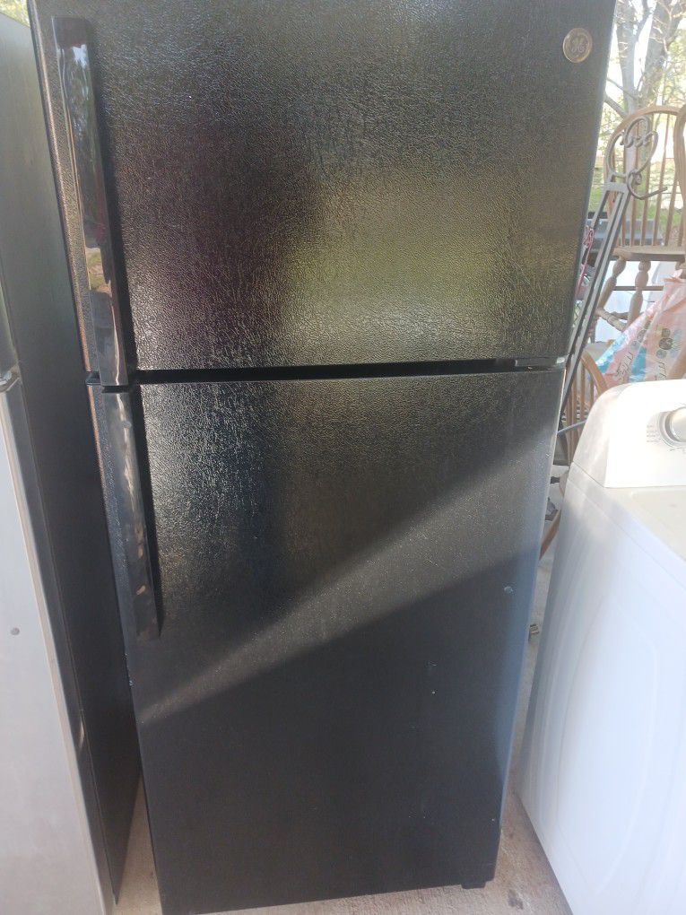 Black Refrigerator And Stove 