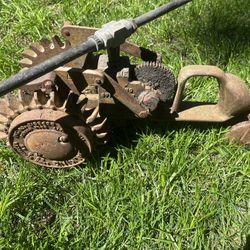 Vintage Cast Iron Walking Lawn Sprinkler