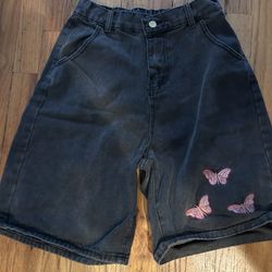 Women's. Black denim shorts with pink butterfly embroidery size medium 