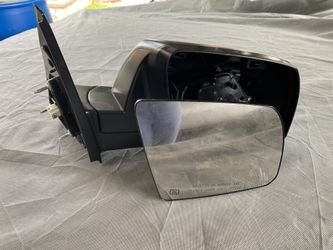 2017 Toyota Tundra passenger mirror electric motion and defroster.