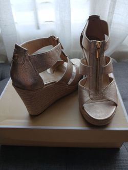 MK  gold Wedge, size 10M