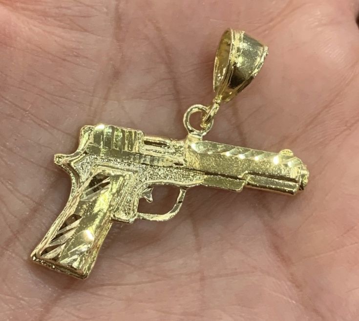 New Gold plated Gun Pendant One pc pendant only Gold plated over Sterling silver gun pendant Only shipping out