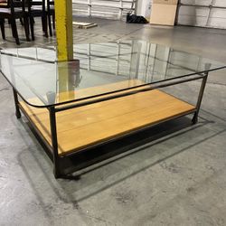 Coffee Table . Glass Top . Metal Frame. Wood Shelf 