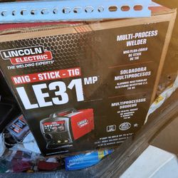 Lincoln Le 31 MIG TIG STICK WELDER  New Never Out Of Box