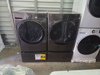 LG thinQ Front Load Washer And Gas Dryer W Pedestal sidekick