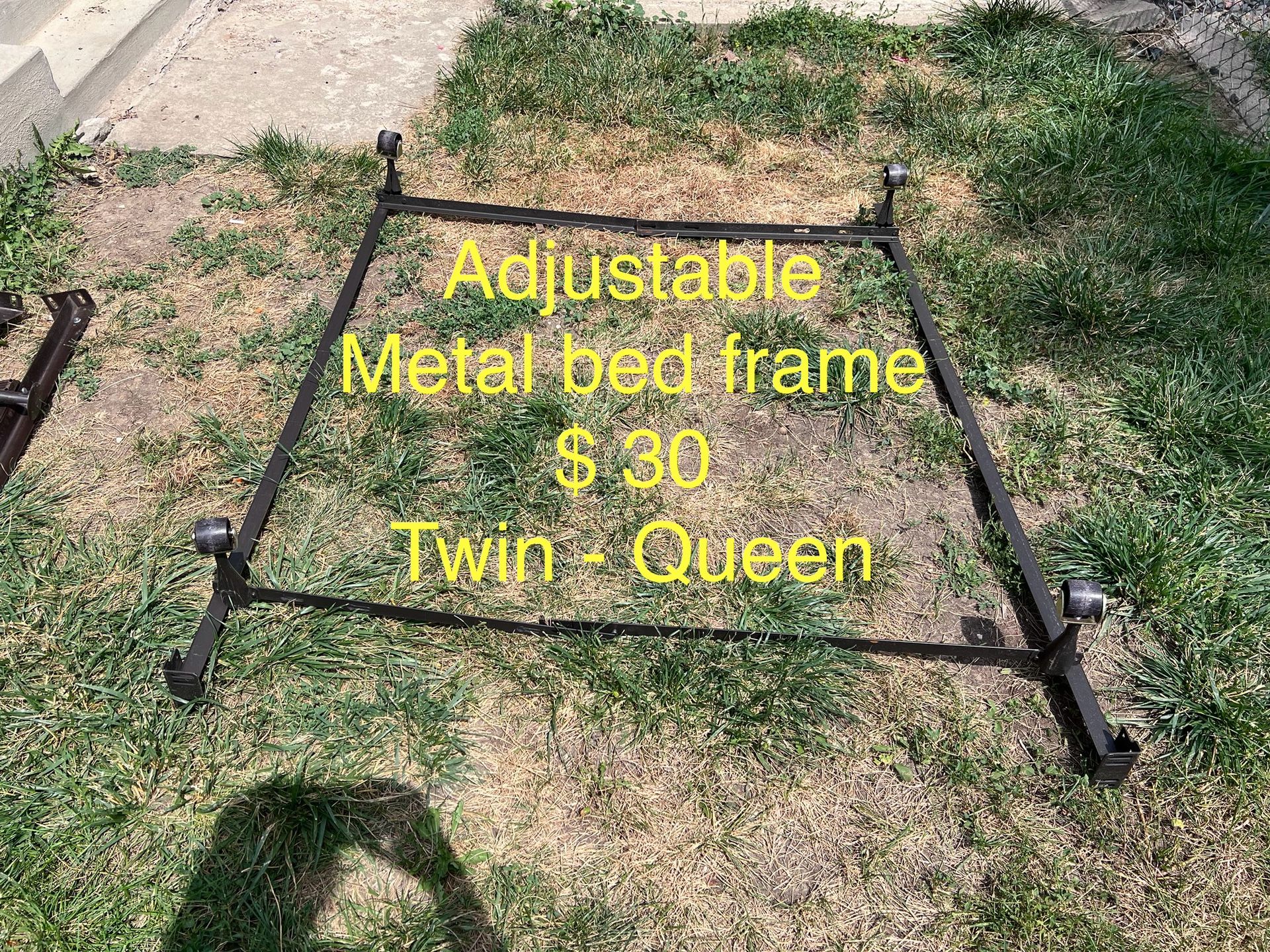 Metal Bed Fram w/Wheels