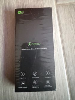 Wireless adapter for CarPlay is made of aluminum alloy and ABS. This black device has a plug-and-play design with a USB-A or USB-C powered interface. 