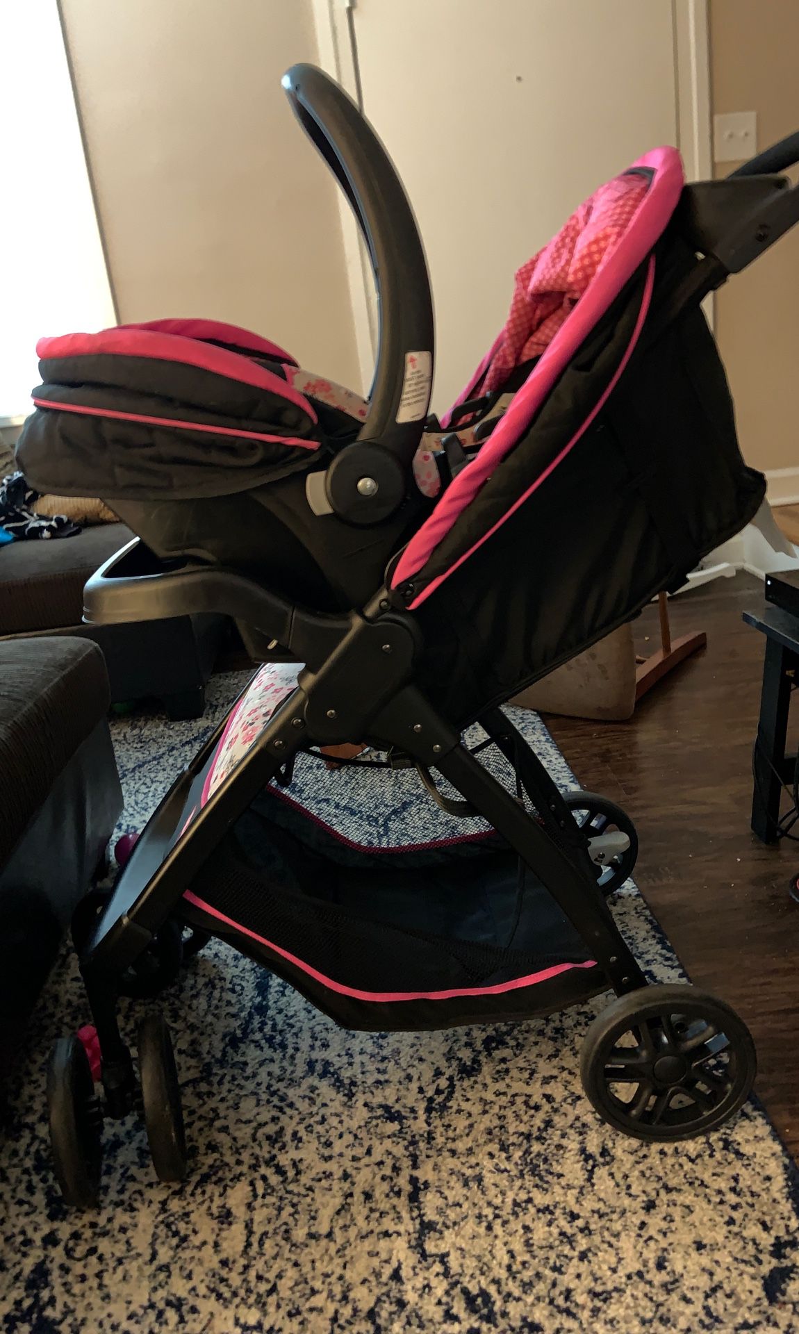 Baby girl car seat and stroller