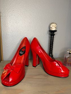 Women’s red heels size 8