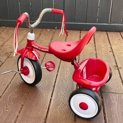 Red Radio Flyer tricycle