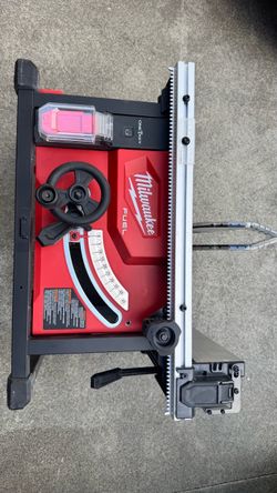 Milwaukee  8-1/4 table saw and stand cordless