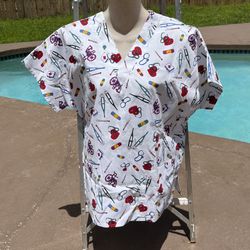 Brand new women’s scrub top, size medium/large